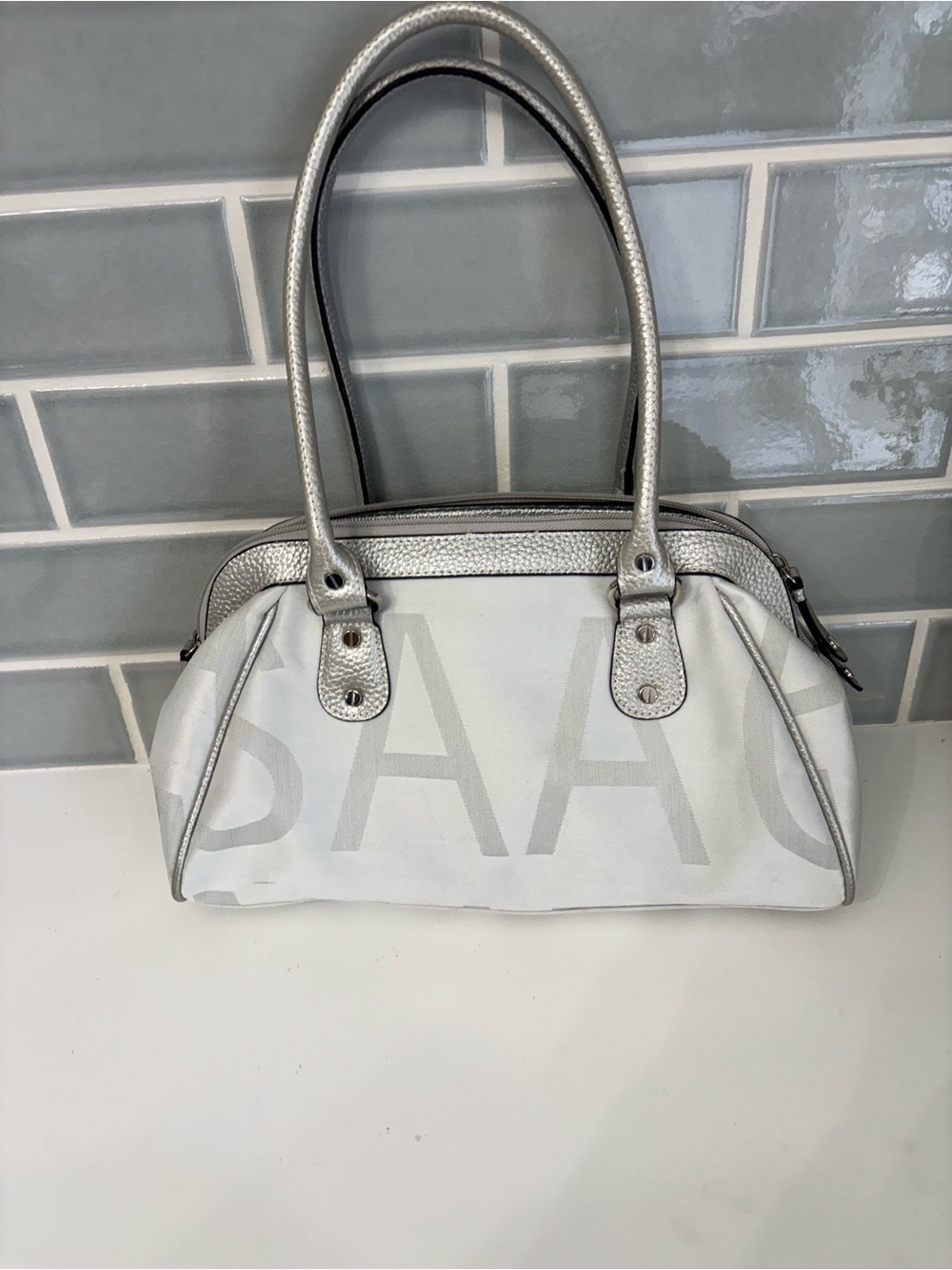 Isaac Mizrahi white and silver purse